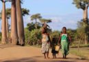 woman wearing green dress while walking