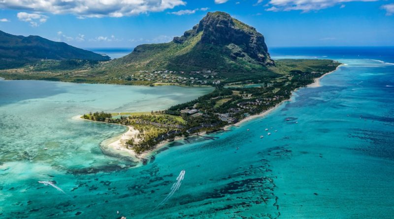 aerial photography of island beside body of water