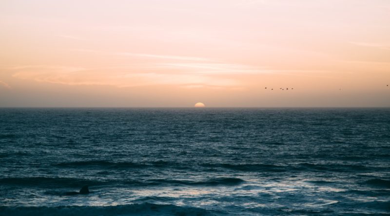sea waves under sunset