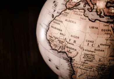 white and brown desk globe