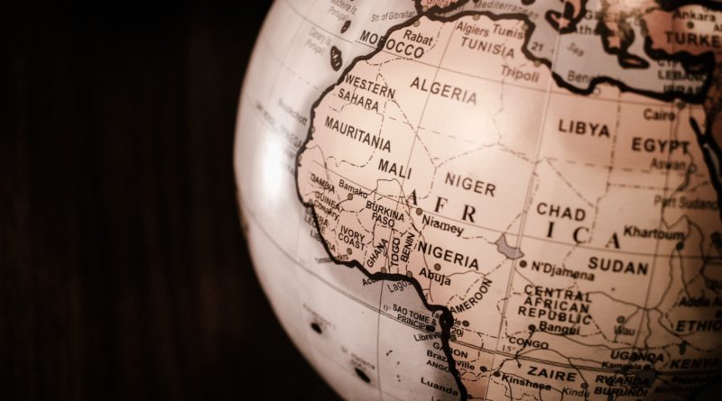 white and brown desk globe