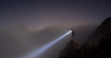 man standing on mountain