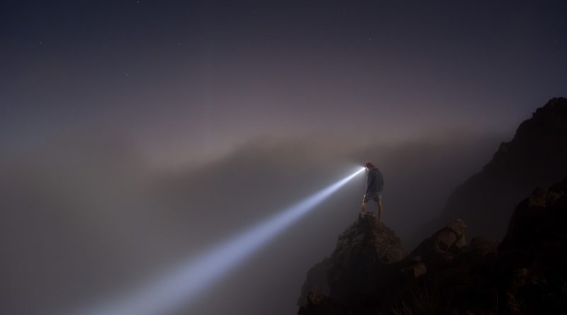 man standing on mountain