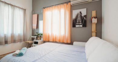 white bedspread inside room