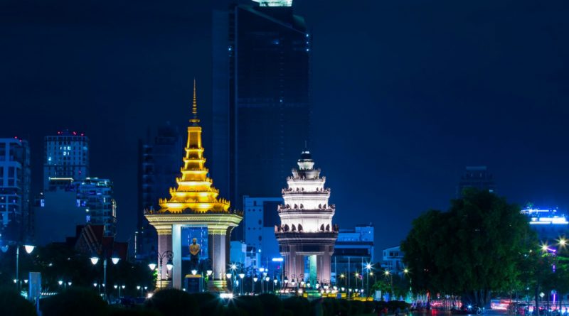 white and gold concrete building during night time